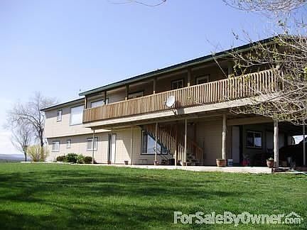 Outside of home : View of wrap-around, covered deck