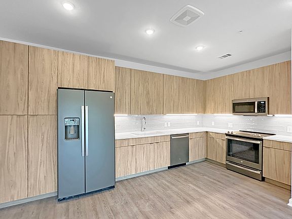 New high-end appliances, quartz counters, lots of cabinet space