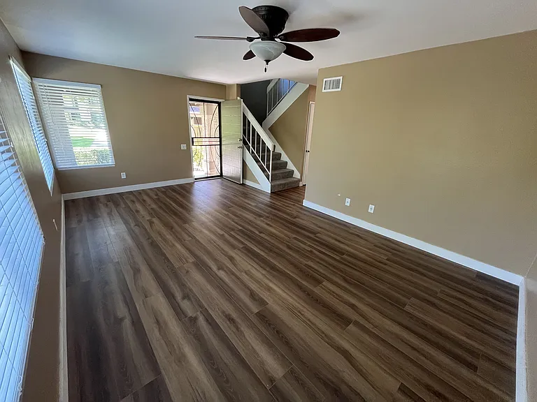 Living room with ceiling fan..