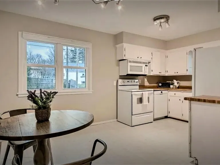 Large kitchen with some new appliances