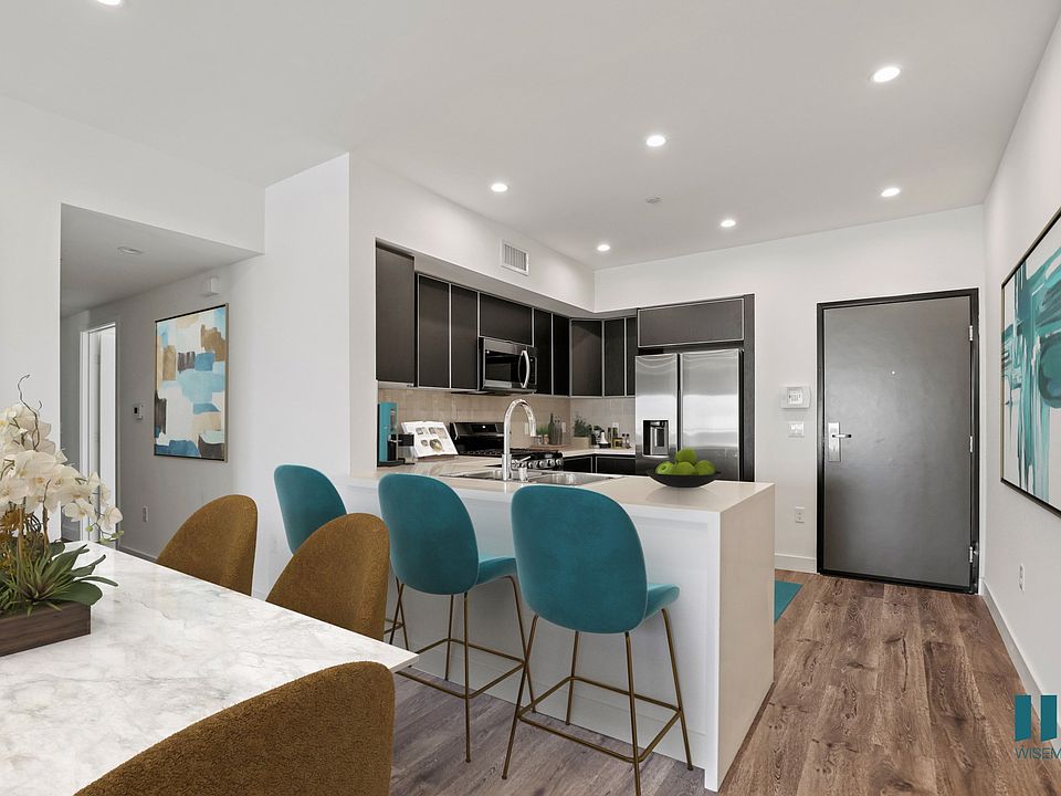 Kitchen with Countertop Bar and Energy-Efficient Appliances