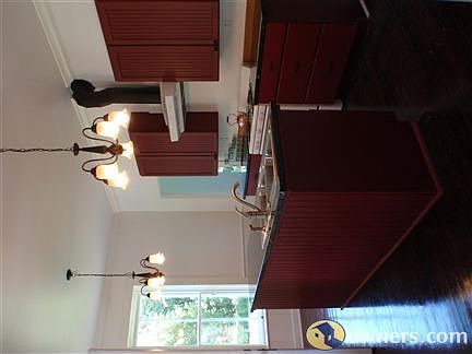 Kitchen with marble countertops, hardwood