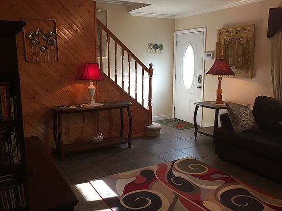 Inviting living room with tile flooring.