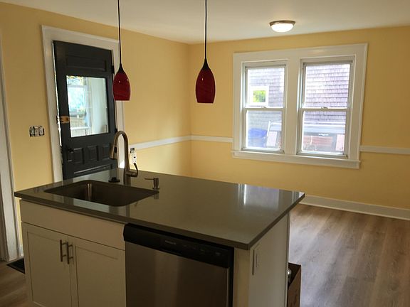 Eat-in-kitchen. Three-season porch off kitchen leads to backyard (sorry, no picture).