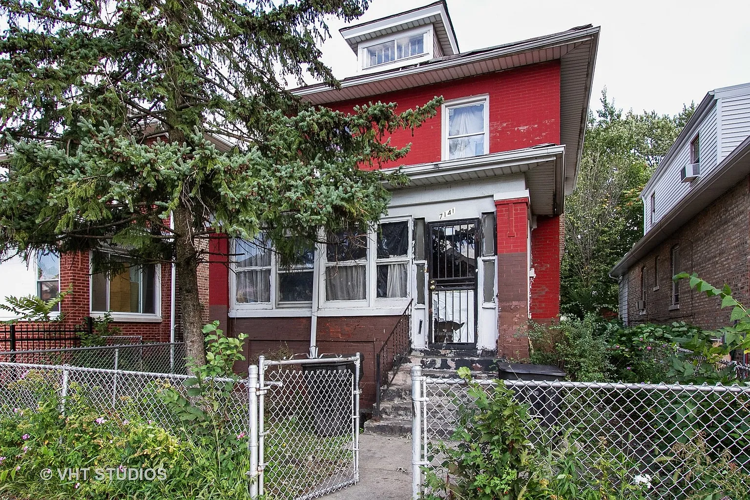 7141 S Woodlawn Ave photo 1