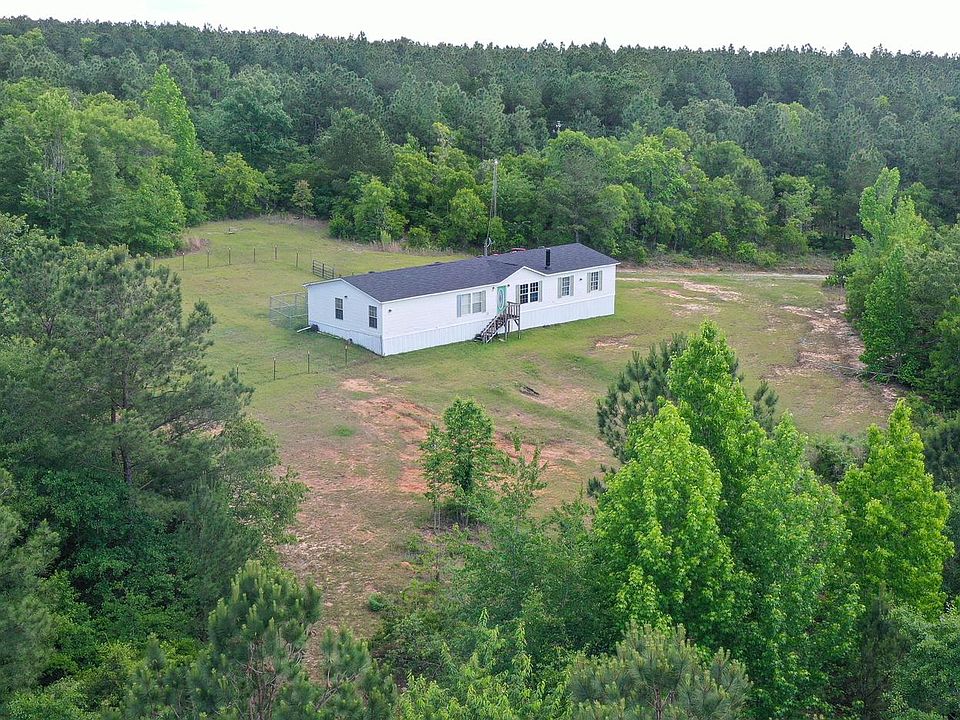 Spacious Home sitting on 10 acres. Private gate leading into property.