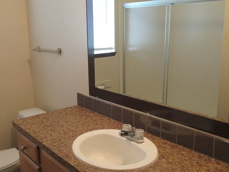 Downstairs Two Bedroom Apartment with Garage — Photo 8