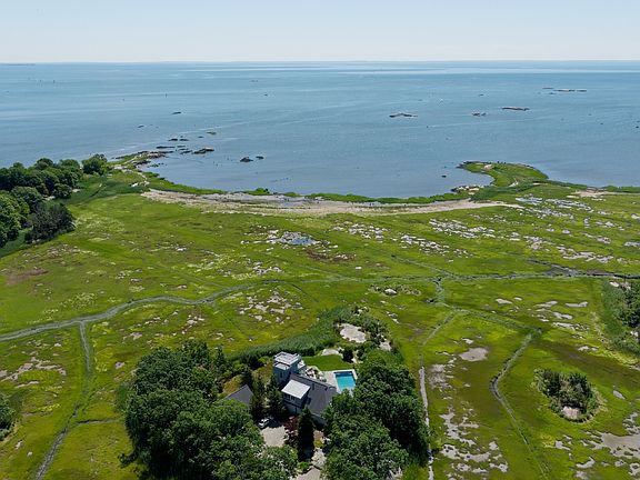 Unobstructed south facing views of Long Island Sound and Faulkner's Island. This private 6.64 Acre private oasis is surrounded by approximately 30 acres of open space.