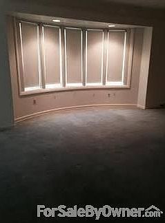 Living Room w/Bay Window
						:
						Living Room w/Bay Window and Custom made window shades