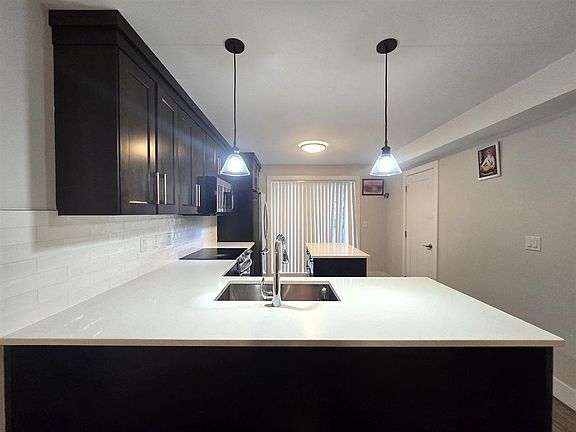 5th image of 32138 George Ferguson Way #11