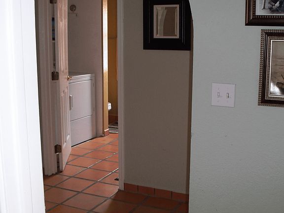 hallway to bath #1 -washer and dryer