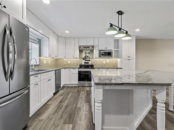 3rd image of 8915 Village Green Blvd