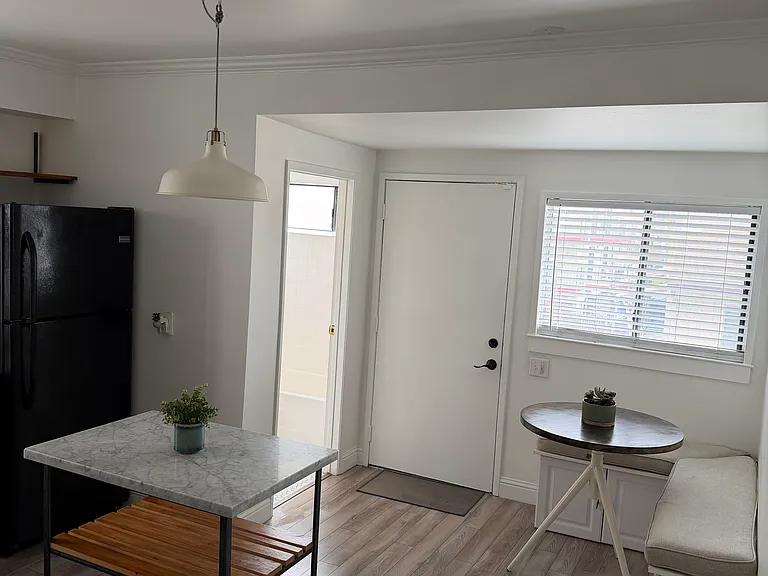 Backdoor to staircase/backyard