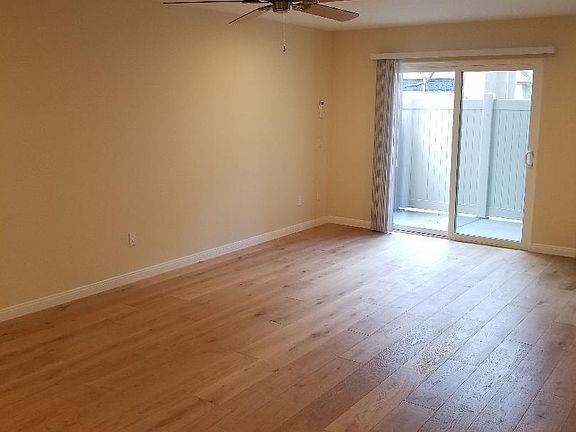 There is a small enclosed patio in the front with sliding door access from the living room.