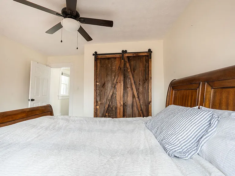 Master bedroom
NOTE: This bed frame stays with the house. Mattress removal is negotiable.

Bed frame has bottom drawers for extra storage space :)
