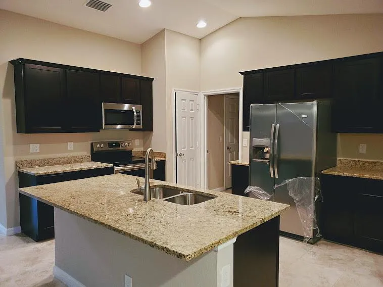 granite counter tops and stainless steel appliances