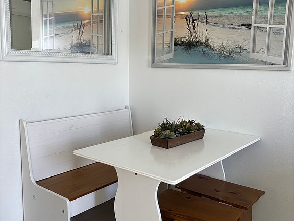 Dining area with booth sitting.