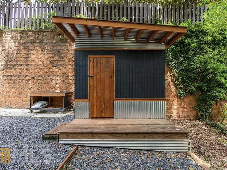 Outdoor 6x10 storage. Built in shelves.