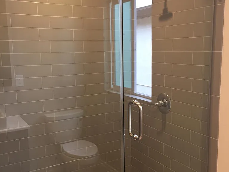 1st upstairs bath with seamless glass shower