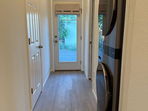 LG laundry tower, coat closet and half bath