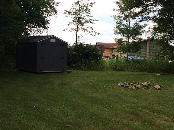 Firepit and outdoor storage.