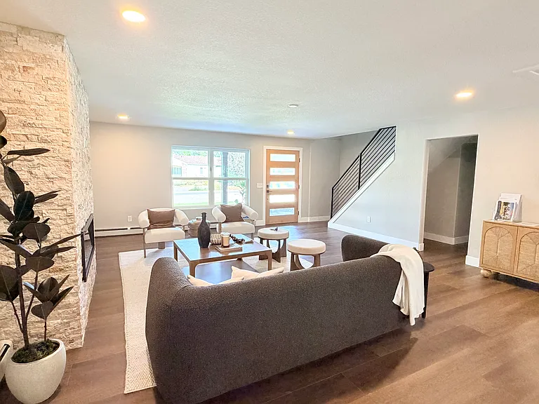 Living room to front door and front porch