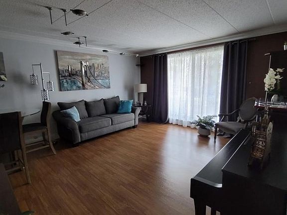 3rd image of 9118 W Elmwood Dr APT 2B