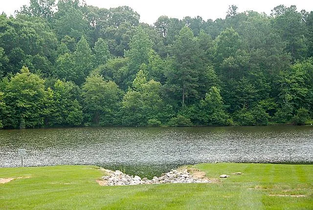 Village Lakes has 4 miniature lakes for kayaking, boating, and fishing. View of lake behind home.