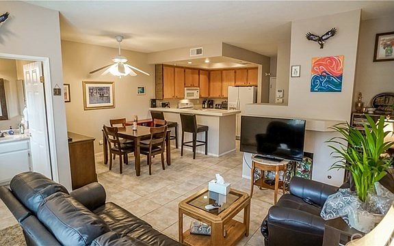 Family open to eating area and kitchen