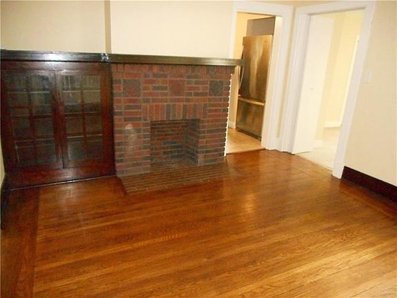 Dining Room: Display your treasured collections in the built-in curio in the dining room.