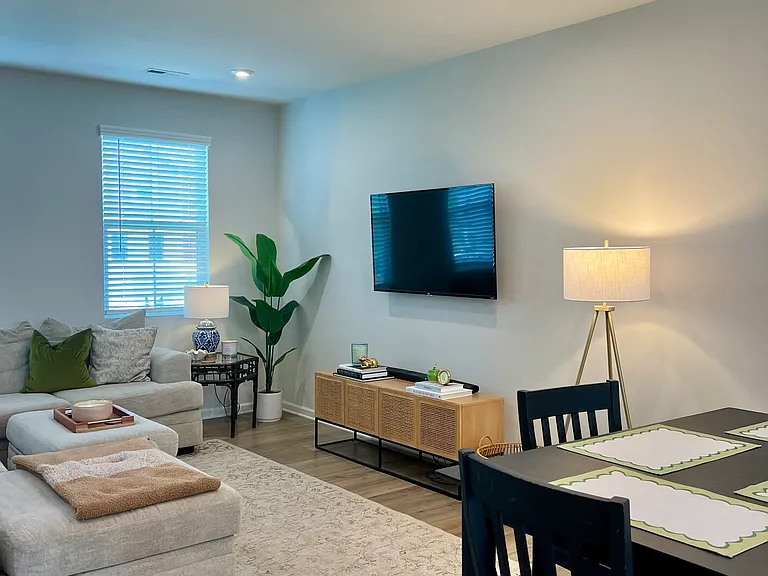 dining room table, sectional couch, and console table under TV can be included in the lease