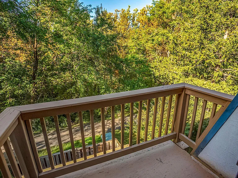 Patio off master bedroom overlooking the back.