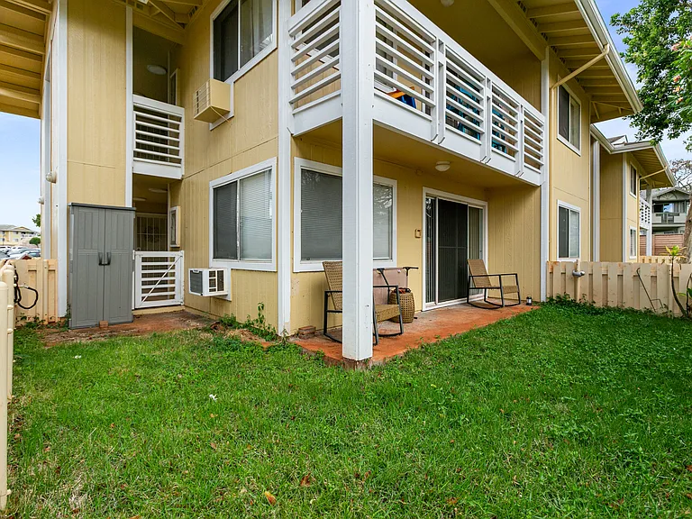 Fenced Yard w/ Storage