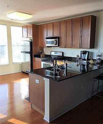 5th image of 7243 Madison St APT 406