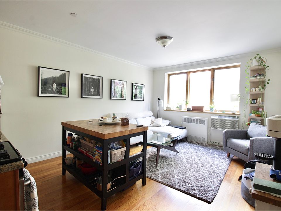 1st image of 420 E 11th St APT 3A
