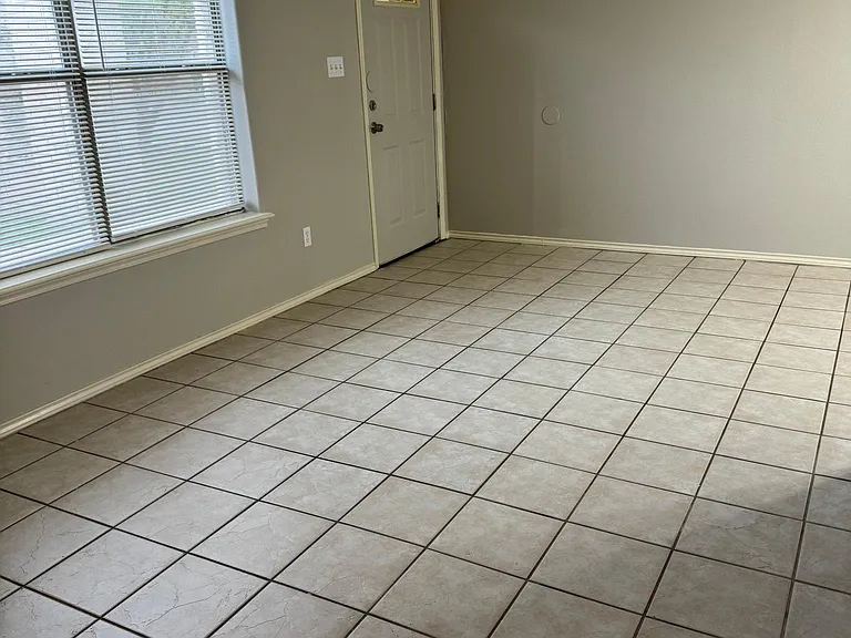 Living room looking at front door.