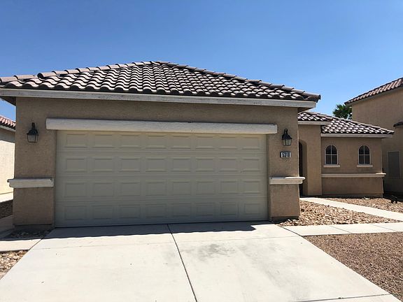 Two-car garage coupled with a two-car driveway