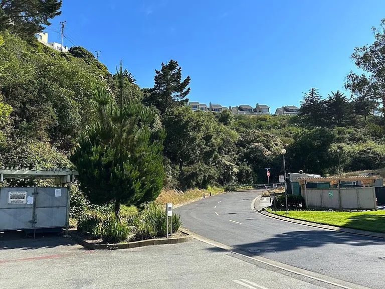 Wide streets and isolated garbage area