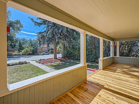 Freshly redone red cedar front porch decking.
