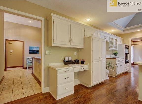Kitchen office, pantry and double wall ovens and beautiful hardw