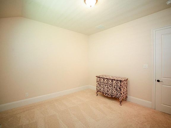 Secondary bedroom downstairs has full bath