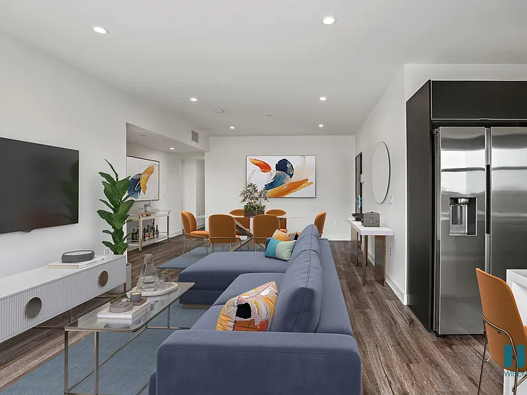 Open-Concept Kitchen, Dining, and Living Room with Vialy Flooring and Recessed Lighting