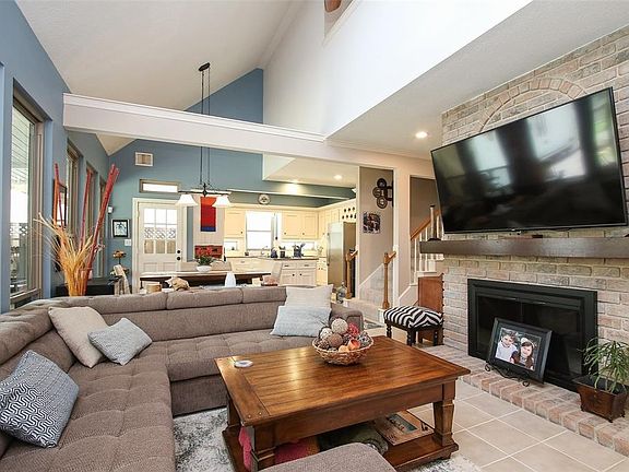 The Family Room has another fireplace to cozy around