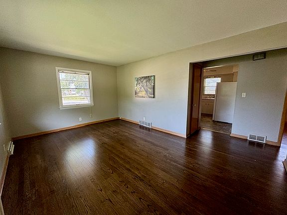 Living room with refinished hardwood floors