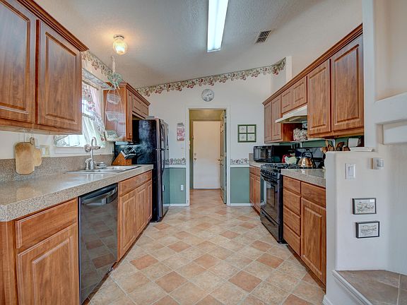 4th image of 9922 Wind Cave Dr NW