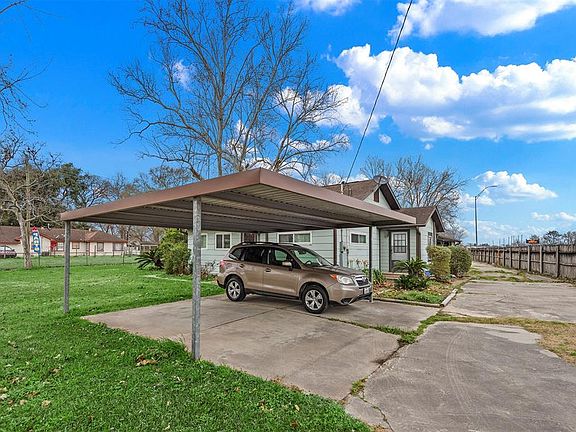 There is enough covered parking for 2 vehicles just inside the automatic gate. This is just a few steps away from the front door of the main house.