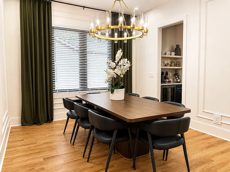 The Five Point Loft game room is ready for the challenge! This entertaining space boasts a large smart tv, plenty of games, shuffleboard, plush bean bags and seating, and playful lounge energy upstairs.
