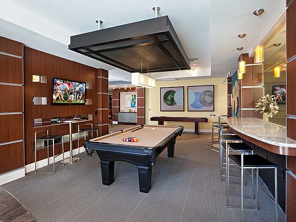 Clubhouse Game Room with Billiards and Shuffleboard