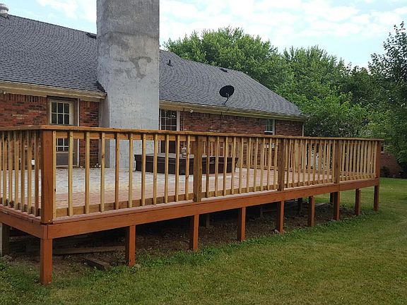 Large deck built around 6 personHottub