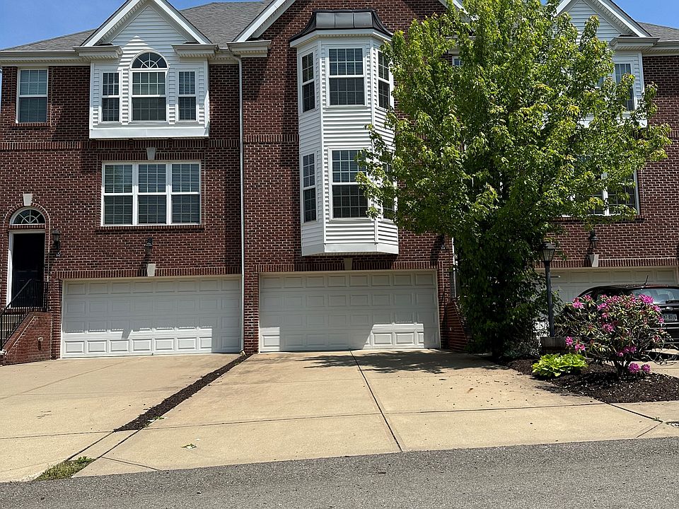Traditional brick home with a two car garage